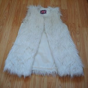 White faux fur vest